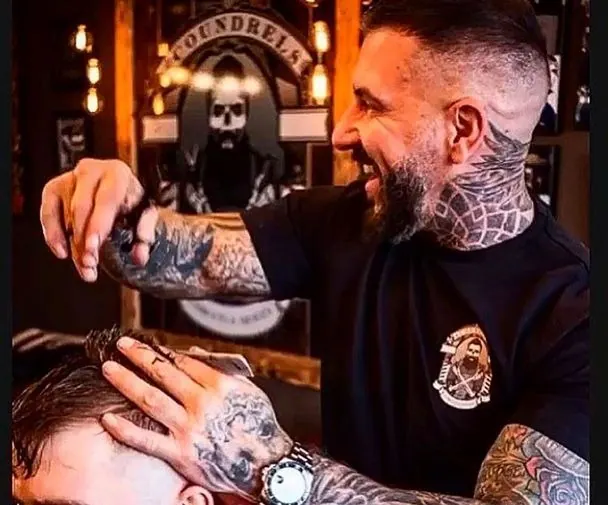 A cut in progress at Scoundrels Barbers